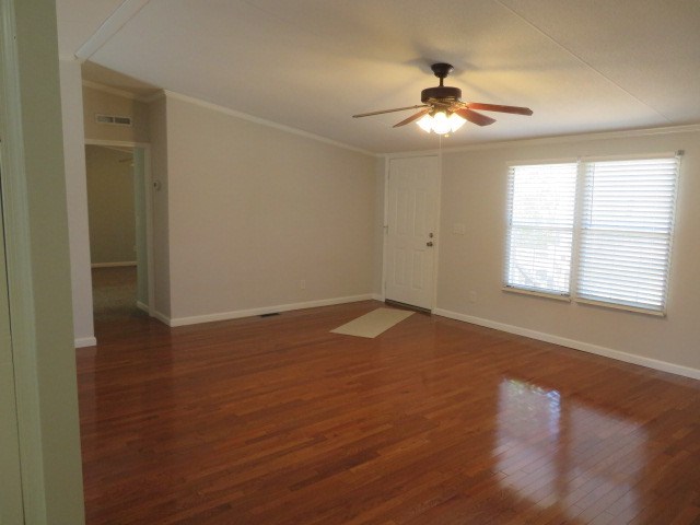 574 Fort Perry Road Box Springs, GA 31801 - Photo 3 of 39 View from Kitchen into LR.