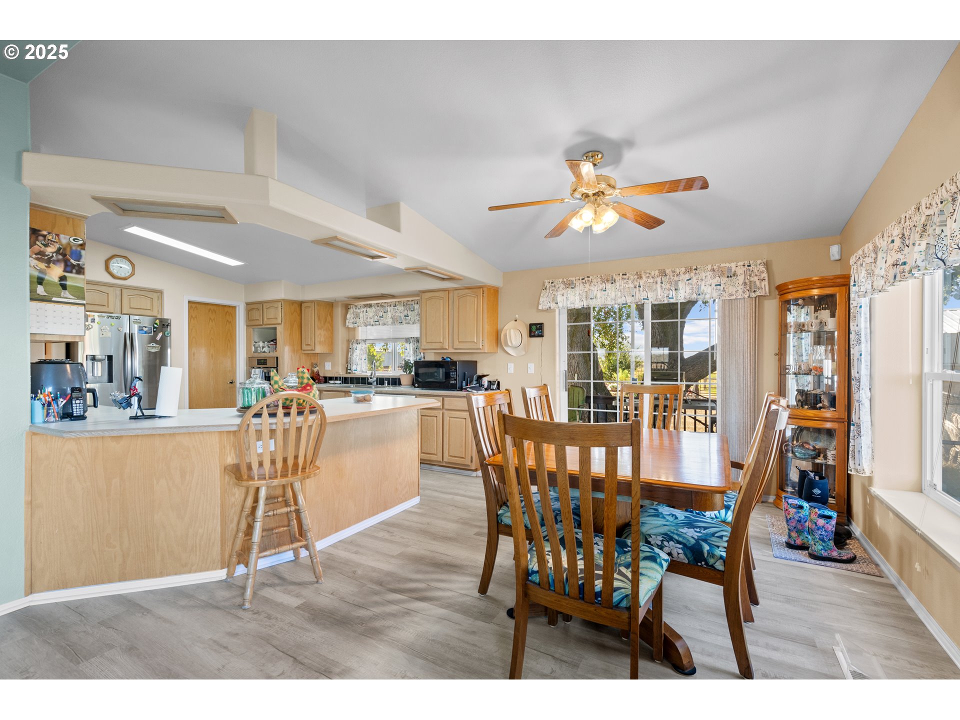 34656 County 1172 Road Stanfield, OR 97875 - Photo 9 of 48 a view of a dining room with furniture and a chandelier