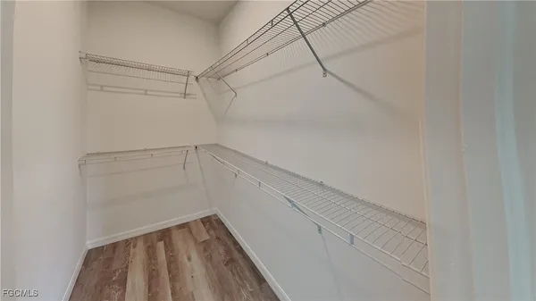 a view of a room with racks on the wall