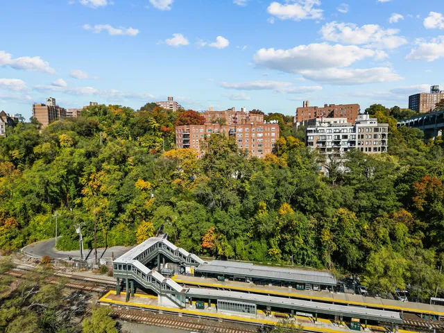 a bathroom with a sink a mirror a bathtub and shower
