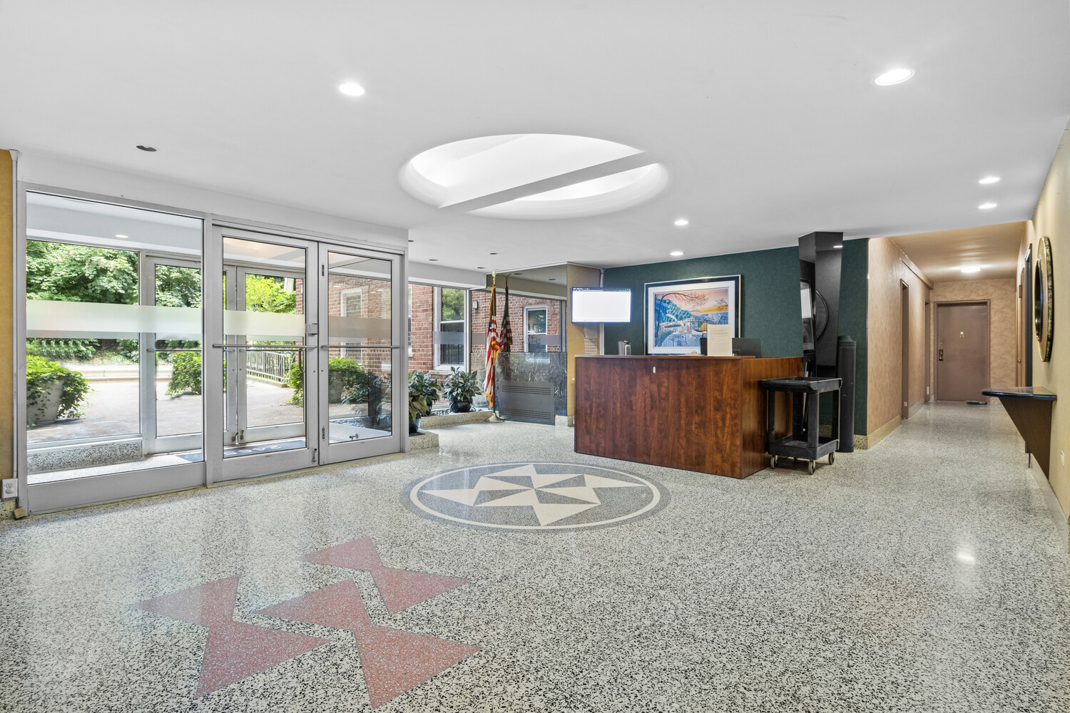 2465 Palisade Avenue, Unit 7H Bronx, NY 10463 - Photo 14 of 15 a view of a livingroom with furniture and window