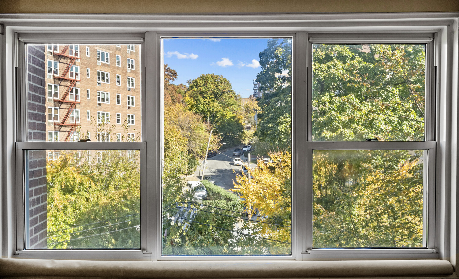 2465 Palisade Avenue, Unit 7H Bronx, NY 10463 - Photo 8 of 15 a view of a garden from a window