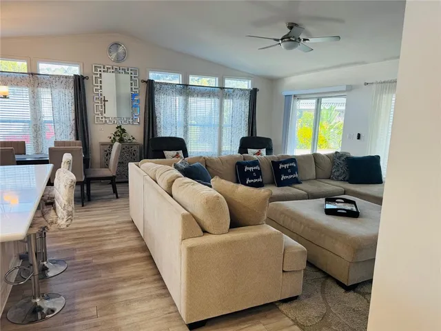 a bathroom with a sink vanity granite and a mirror