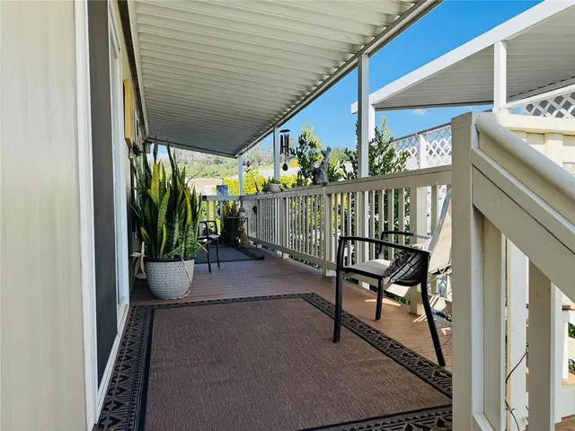a view of a lake with houses in the back
