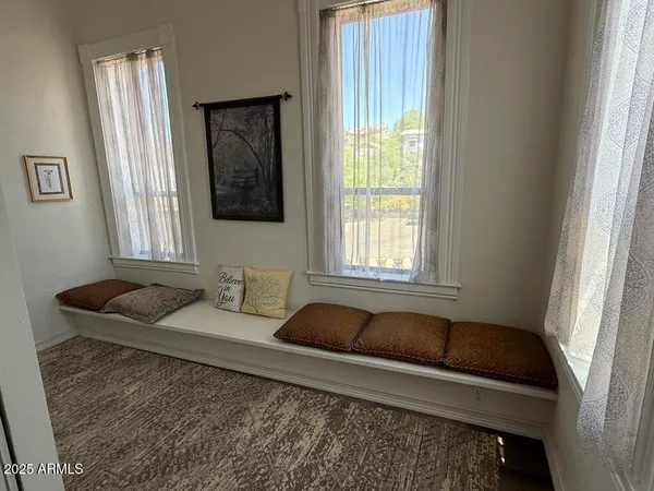 a kitchen with a stove sink and microwave