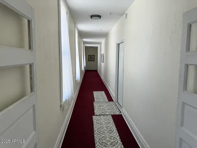 a view of an entryway with a staircase