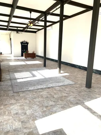 a view of an empty room and window