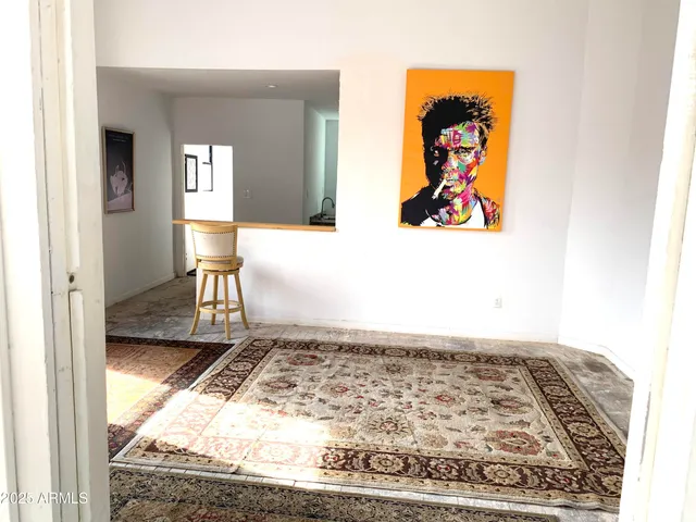 a bathroom with a toilet a sink and a mirror