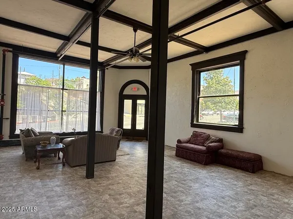 a living room with furniture and a window
