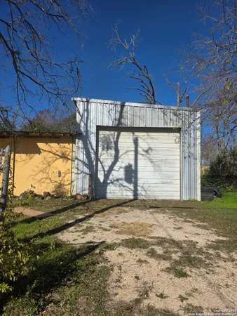 a view of a backyard of house