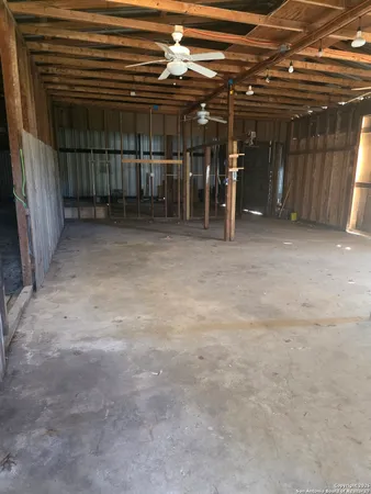 a view of a room with wooden walls