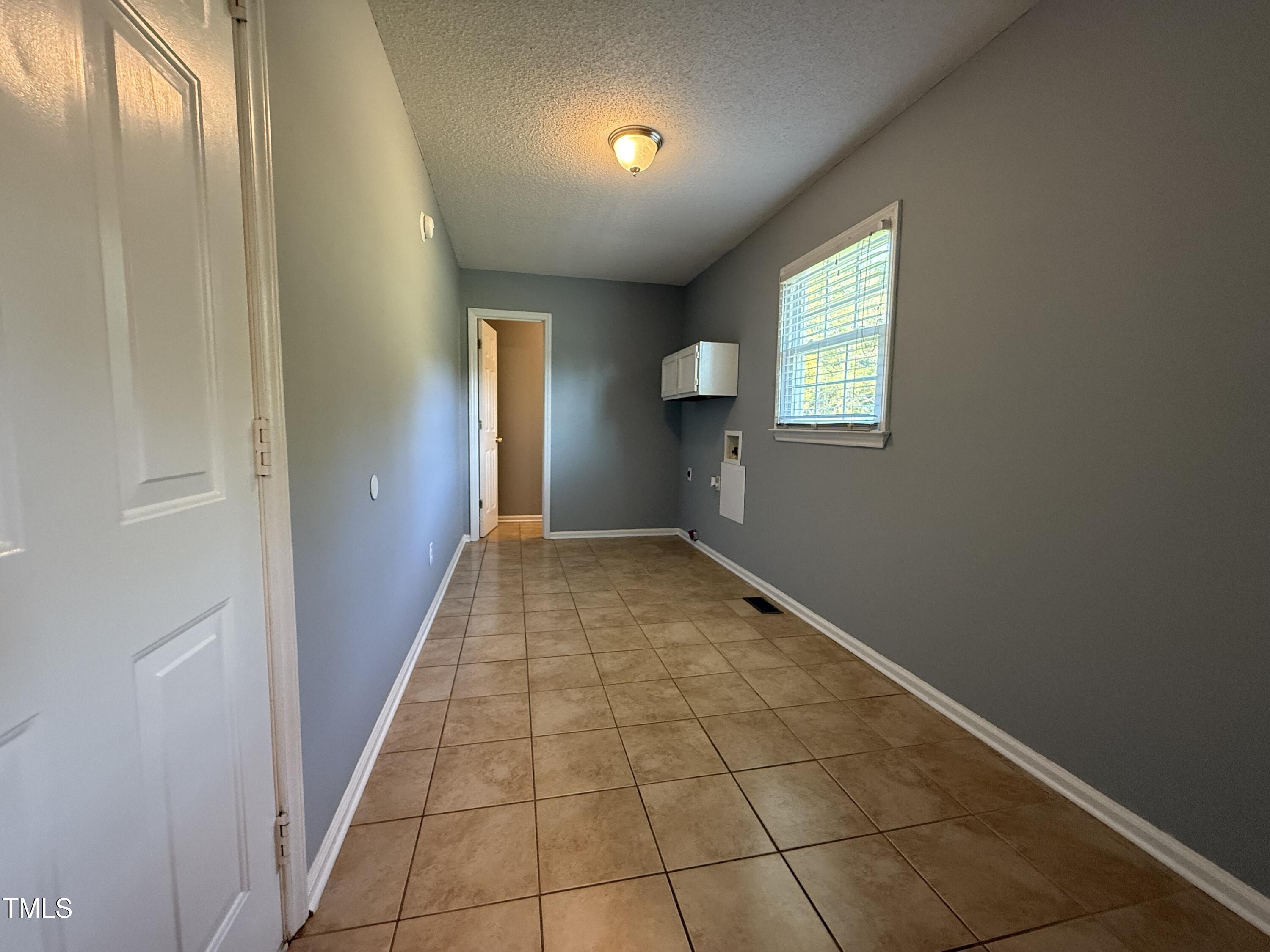 152 Christopher Avenue Princeton, NC 27569 - Photo 16 of 24 a view of an entryway with a window