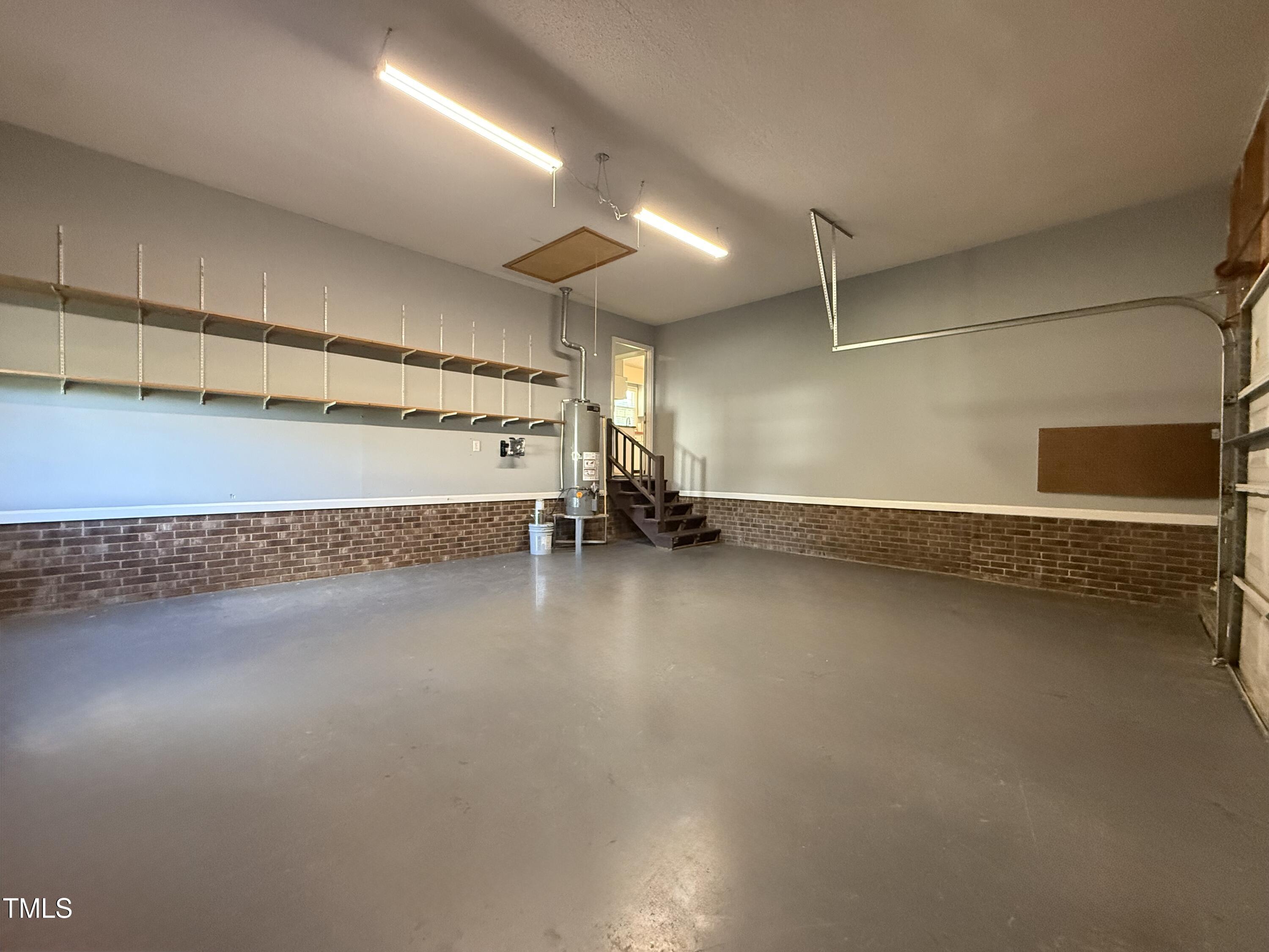 152 Christopher Avenue Princeton, NC 27569 - Photo 24 of 24 an empty room with windows