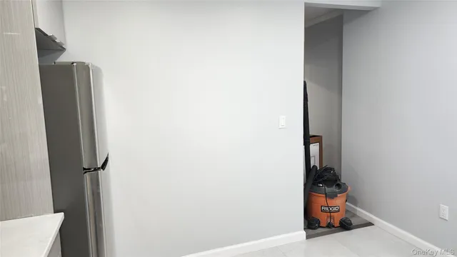 a view of a room with rack and dryer