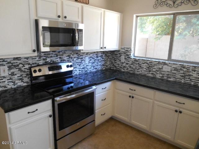 9424 West Eaton Road Phoenix, AZ 85037 - Photo 10 of 24 Modern Kitchen w/Stainless Steel Appls