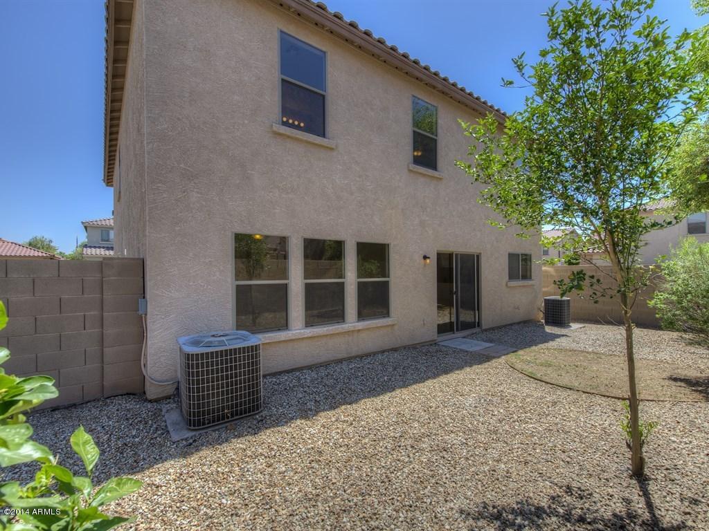 9424 West Eaton Road Phoenix, AZ 85037 - Photo 22 of 24 Backyard w/Fruit Trees