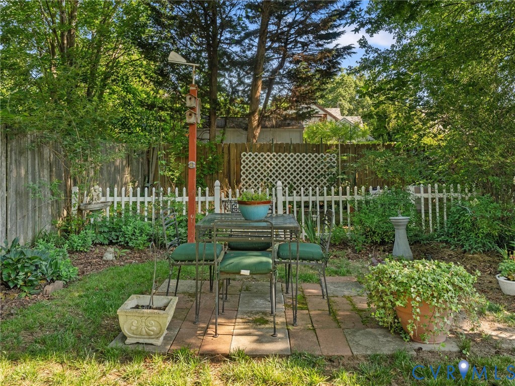 1812 Seddon Road Richmond, VA 23227 - Photo 48 of 56 Landscaped backyard featuring a brick patio, matur