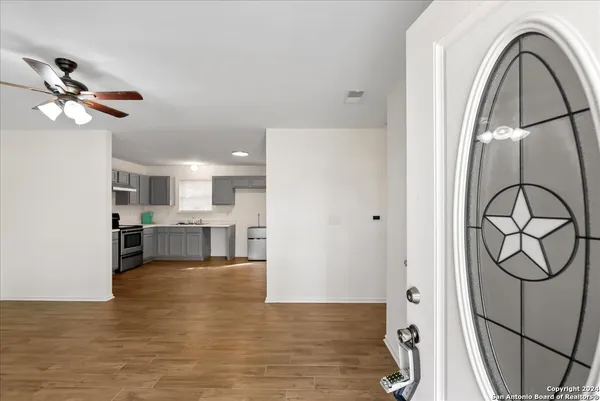 a view of living room with washer and dryer