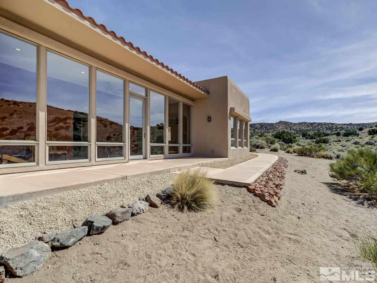 7280 Sage Canyon Road Reno, NV 89510 - Photo 2 of 23 a view of a terrace with a bench