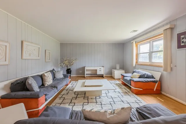 a living room with furniture and a couch