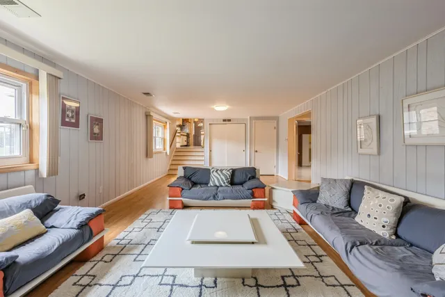 a living room with furniture and a couch