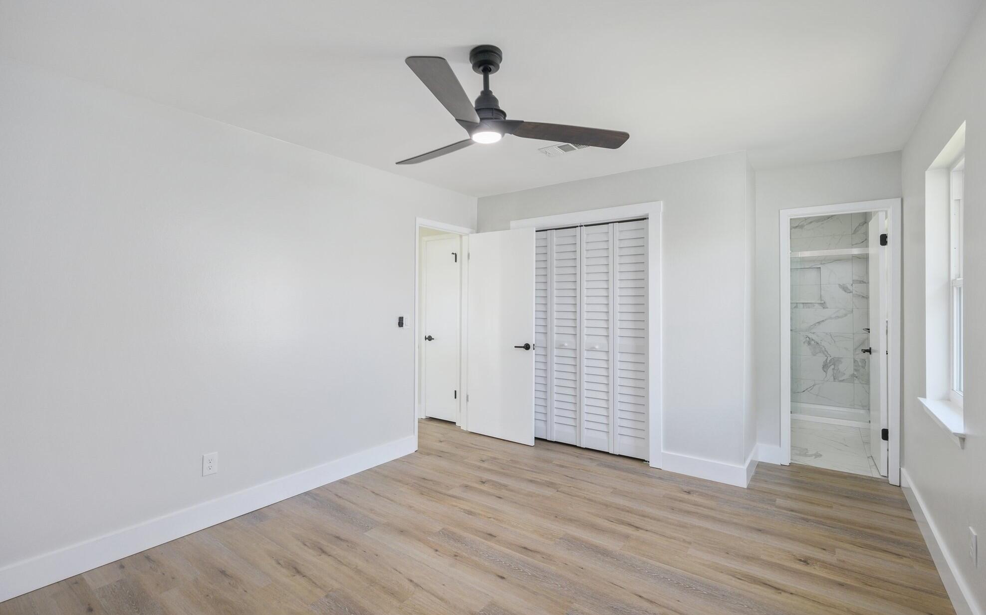 79 11th Street Shalimar, FL 32579 - Photo 17 of 36 wooden floor in an empty room