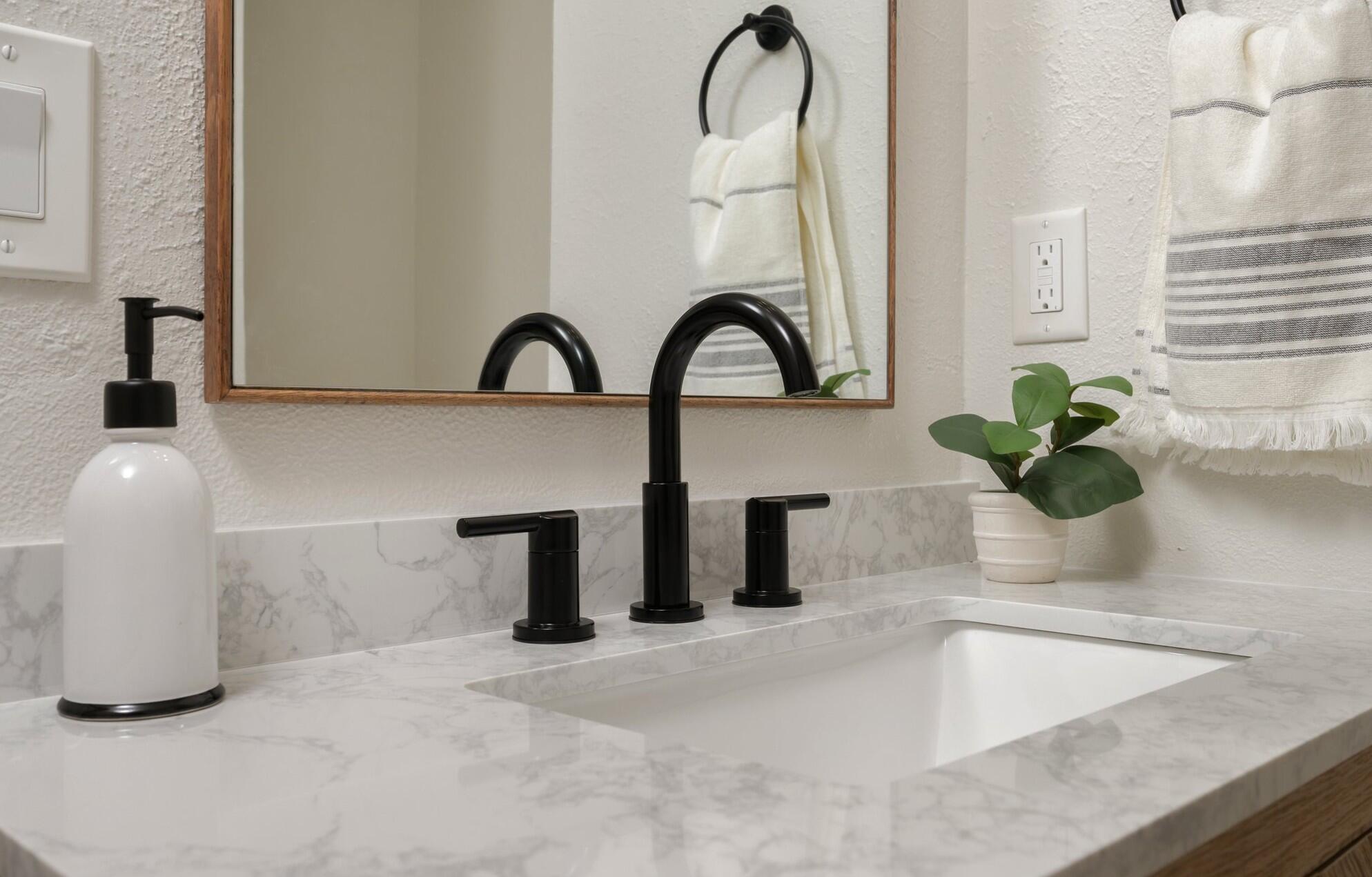 79 11th Street Shalimar, FL 32579 - Photo 24 of 36 a close view of sink and tap