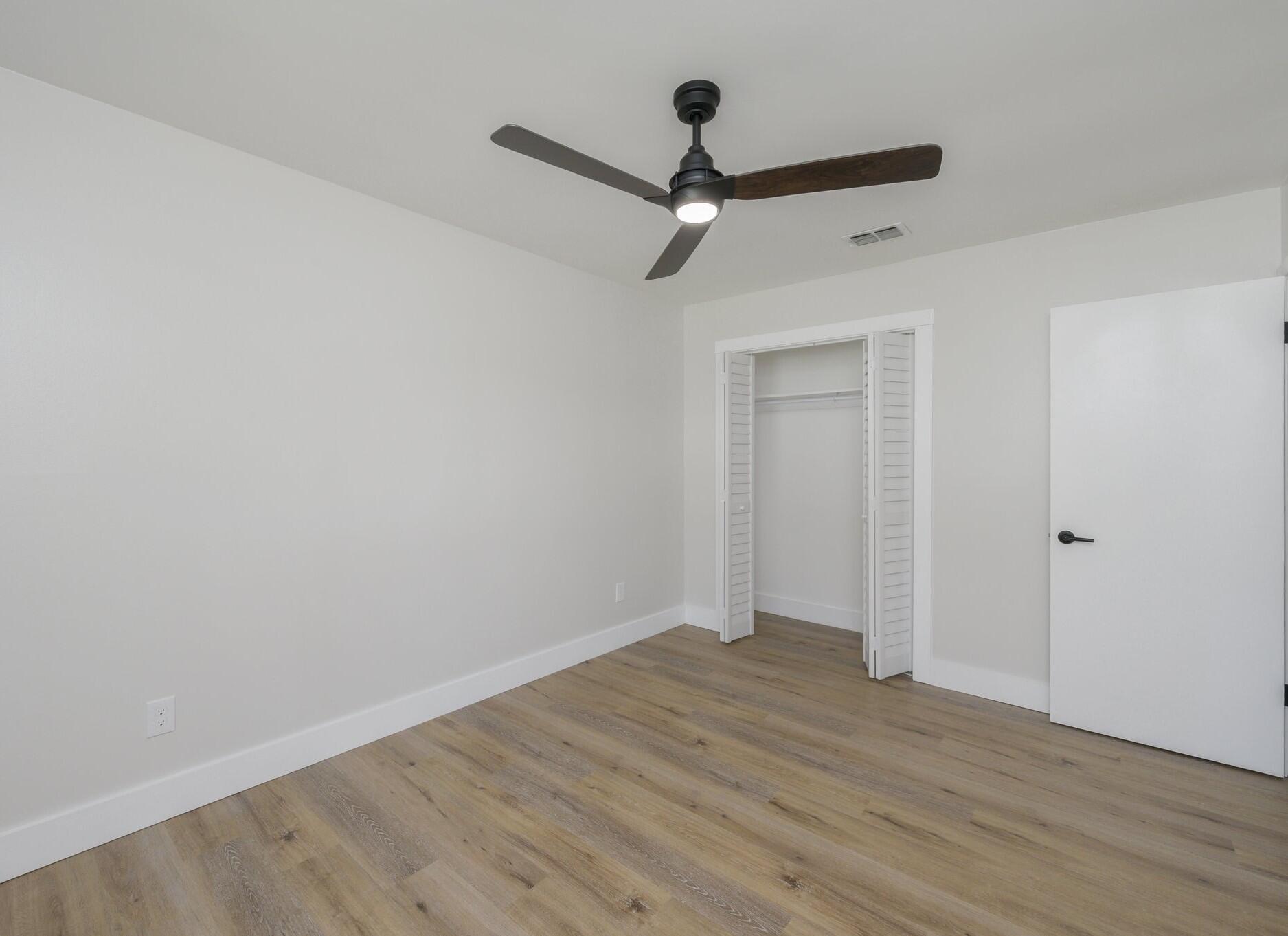 79 11th Street Shalimar, FL 32579 - Photo 27 of 36 wooden floor in an empty room