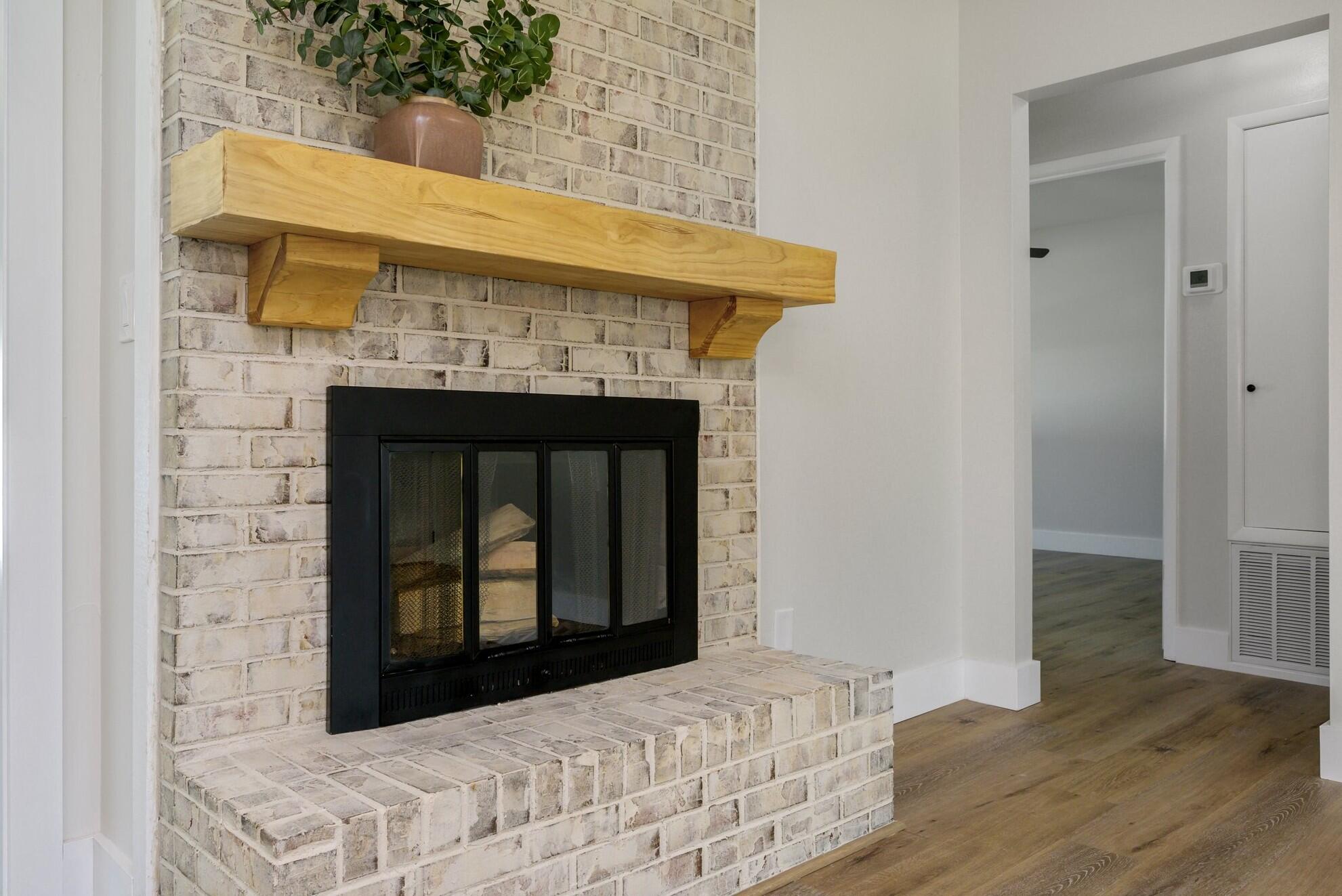 79 11th Street Shalimar, FL 32579 - Photo 7 of 36 a bedroom with a bed and wooden floor