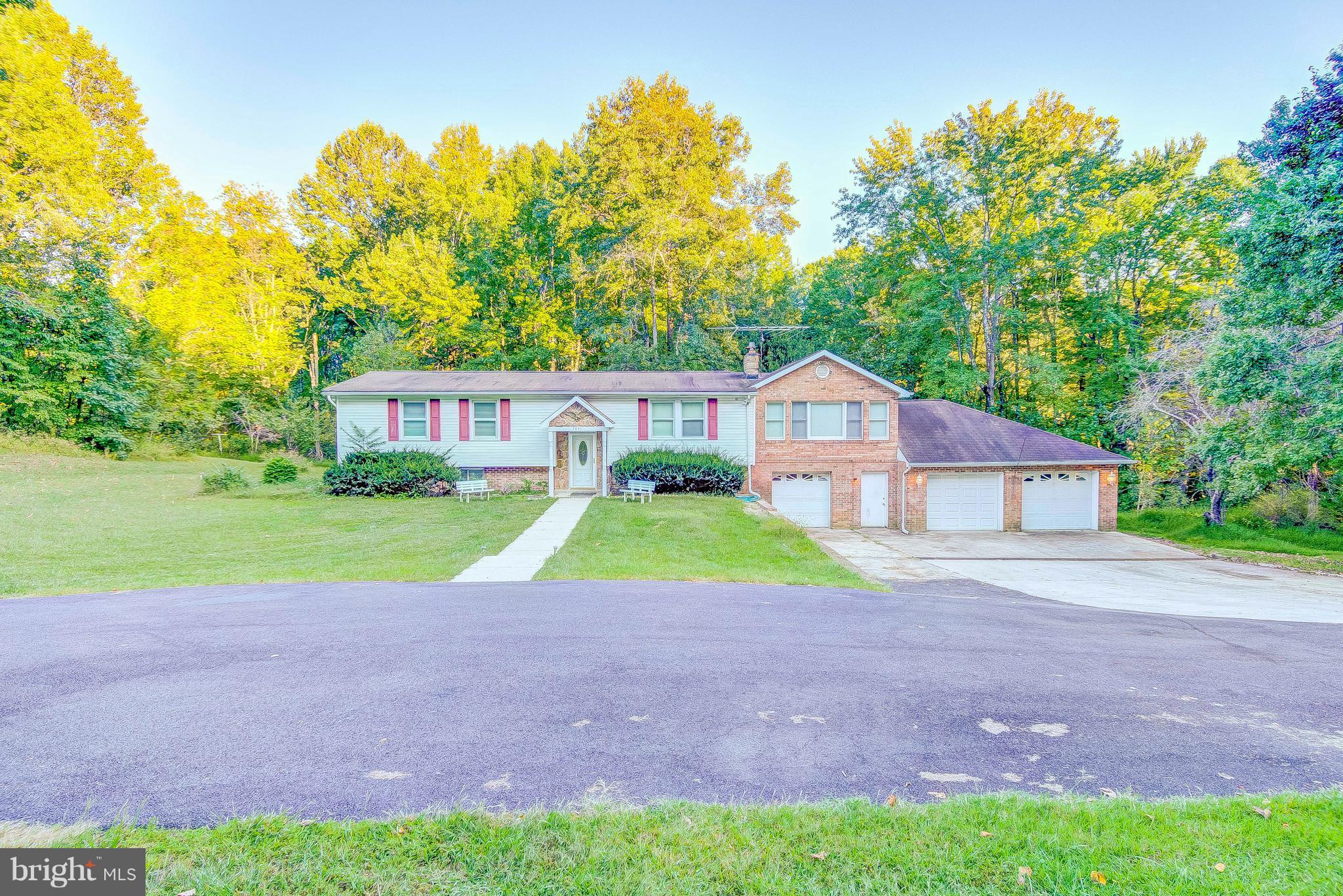 7031 Briscoe Turn Road Owings, MD 20736 - Photo 1 of 29 a view of house with backyard and entertaining space