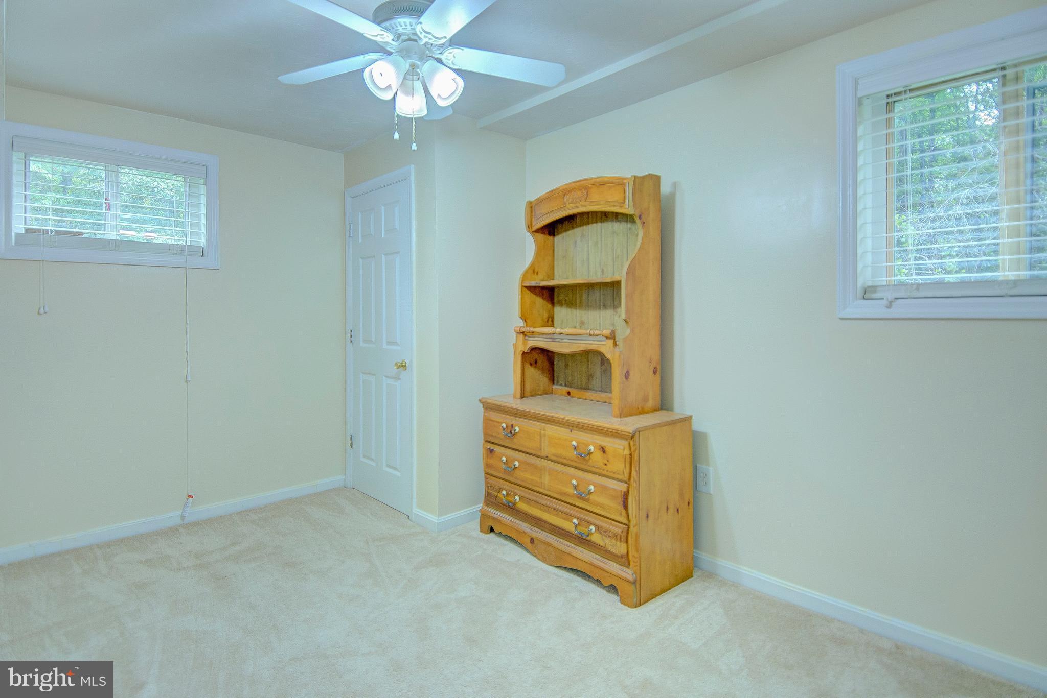 7031 Briscoe Turn Road Owings, MD 20736 - Photo 22 of 29 an empty room with windows