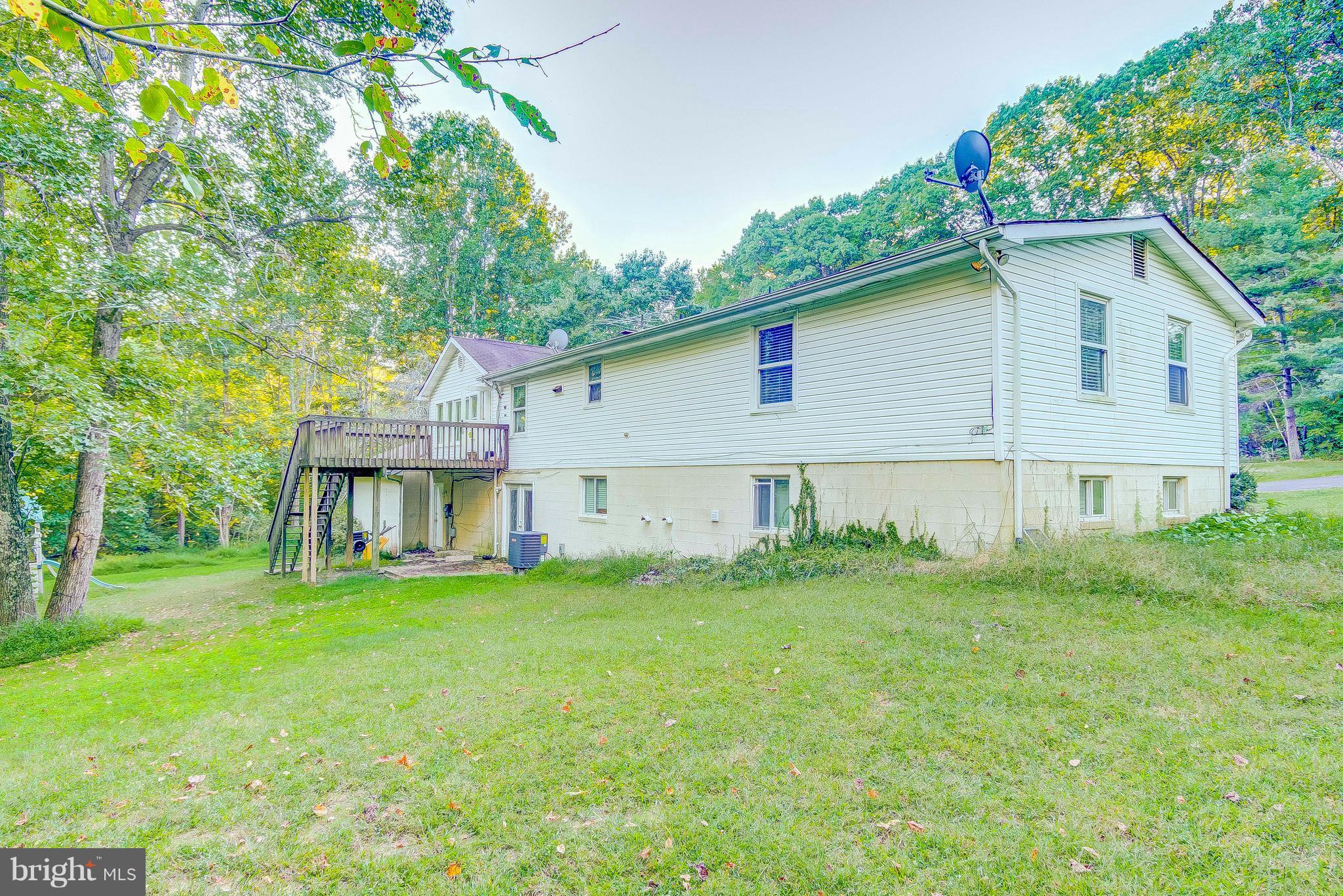 7031 Briscoe Turn Road Owings, MD 20736 - Photo 4 of 29 a view of a house with a yard