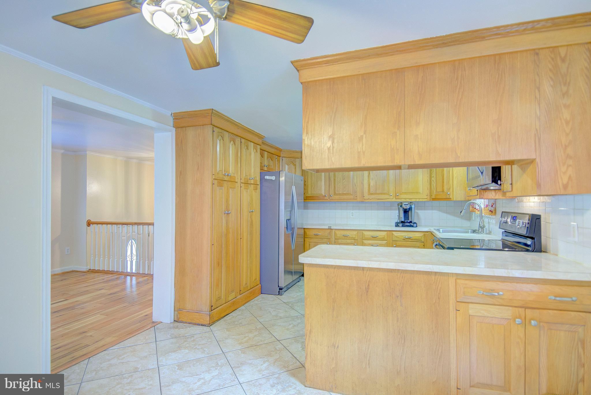 7031 Briscoe Turn Road Owings, MD 20736 - Photo 9 of 29 a bathroom with a granite countertop sink and a mirror