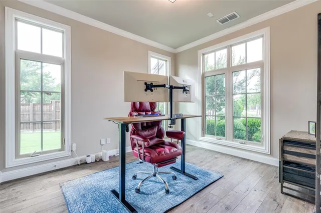 a view of a dining room with furniture window and outside view