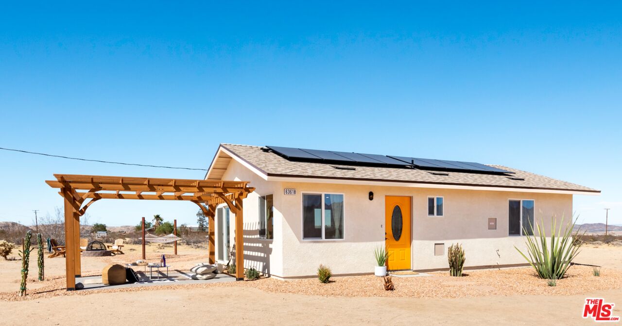 63618 2 Mile Road Joshua Tree, CA 92252 - Photo 1 of 28 a view of a building with car parked
