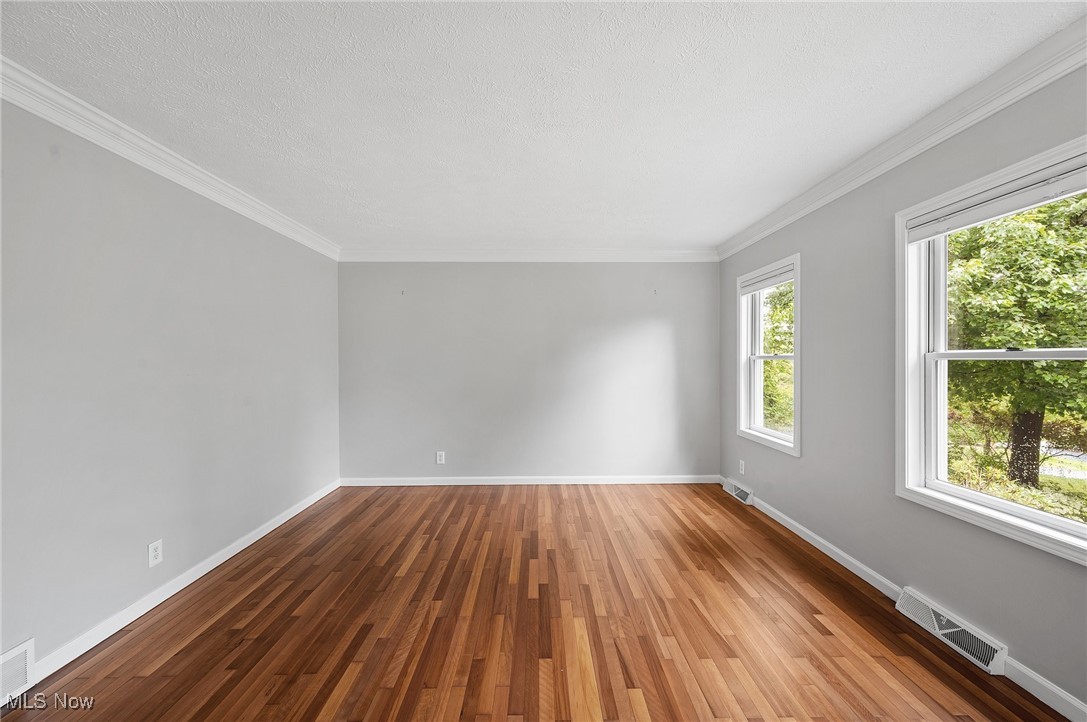 1484 Bell Road Chagrin Falls, OH 44022 - Photo 6 of 36 Natural light fills the living room from two large windows.