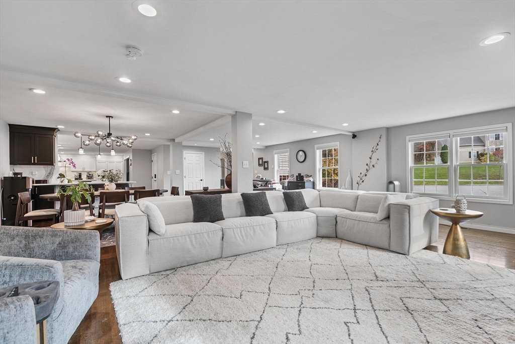 12 Cameron Way Methuen, MA 01844 - Photo 14 of 42 a living room with furniture and a flat screen tv