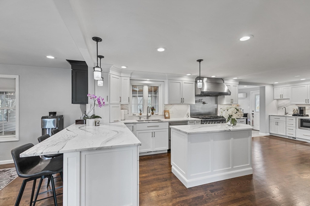 12 Cameron Way Methuen, MA 01844 - Photo 3 of 42 a kitchen with appliances a sink and cabinets
