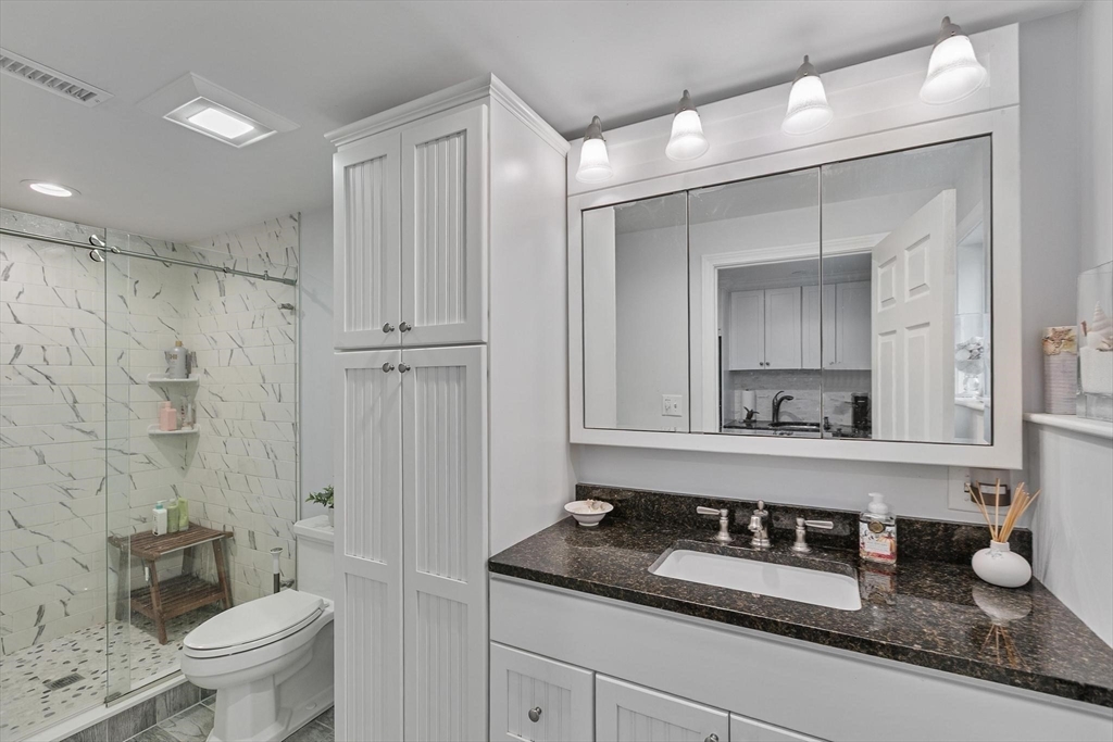 12 Cameron Way Methuen, MA 01844 - Photo 32 of 42 a bathroom with a granite countertop sink toilet and shower