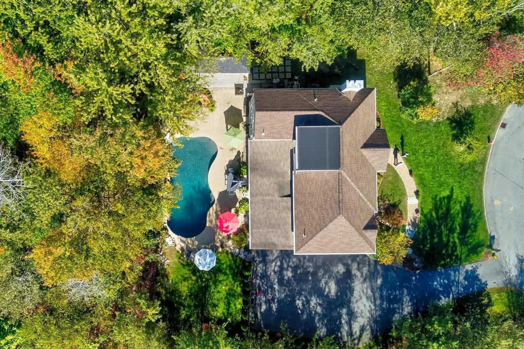 12 Cameron Way Methuen, MA 01844 - Photo 40 of 42 an aerial view of a house with a yard and large trees