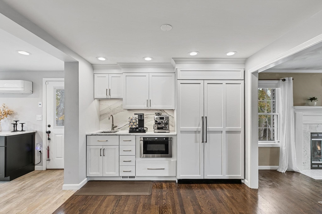 12 Cameron Way Methuen, MA 01844 - Photo 7 of 42 a kitchen with stainless steel appliances a refrigerator sink and cabinets