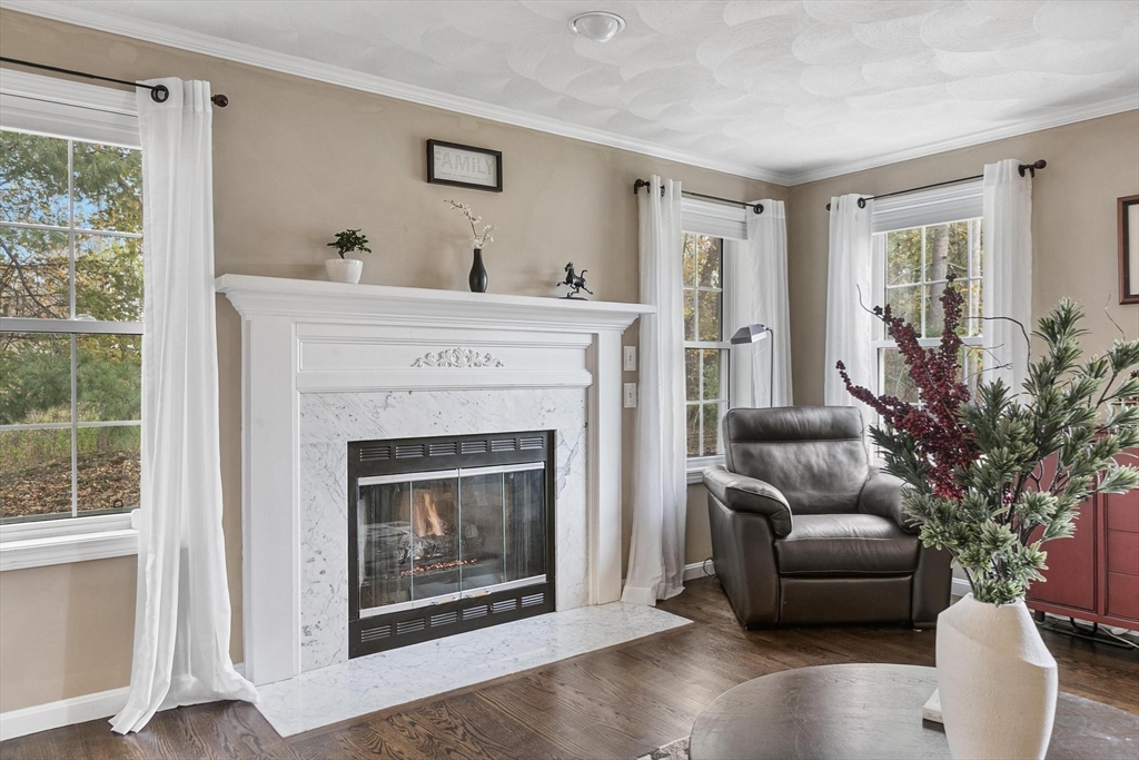 12 Cameron Way Methuen, MA 01844 - Photo 10 of 42 a living room with furniture and a fireplace