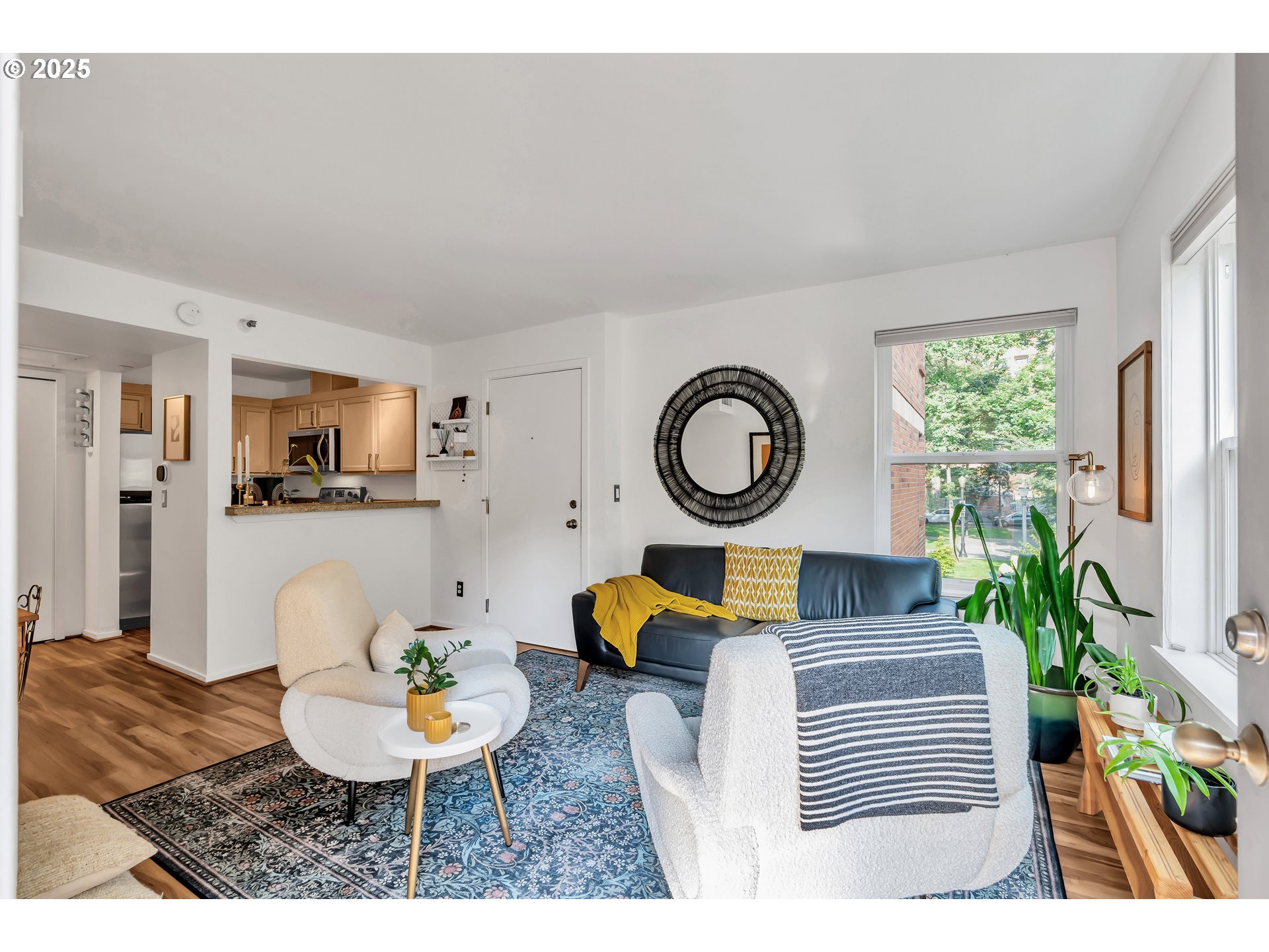 1500 Southwest Park Avenue, Unit 232 Portland, OR 97201 - Photo 12 of 40 a living room with furniture and a chair