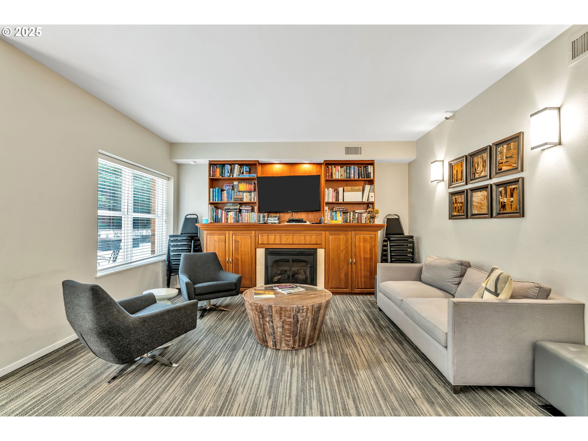 1500 Southwest Park Avenue, Unit 232 Portland, OR 97201 - Photo 24 of 40 a living room with furniture and a fireplace