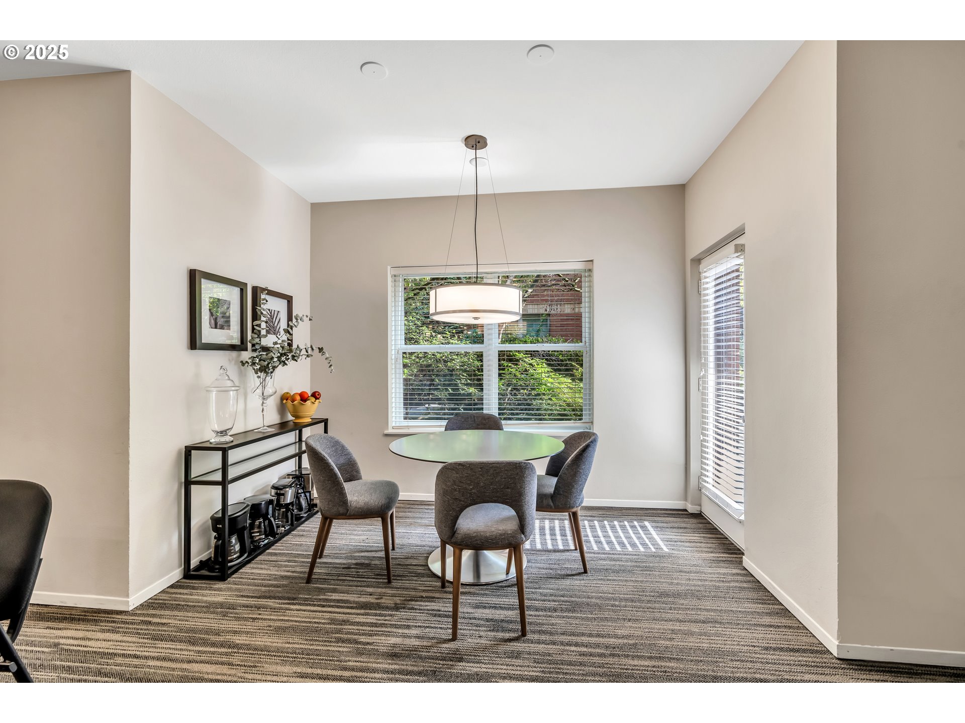 1500 Southwest Park Avenue, Unit 232 Portland, OR 97201 - Photo 25 of 40 a dining room with furniture and window