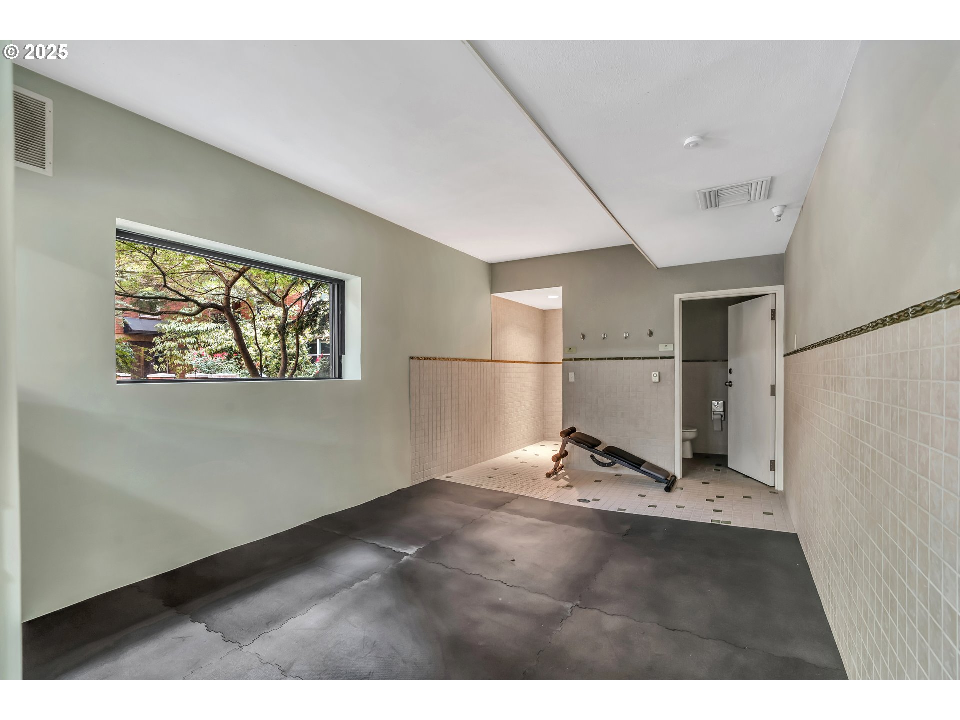 1500 Southwest Park Avenue, Unit 232 Portland, OR 97201 - Photo 28 of 40 a view of a hallway with wooden floor