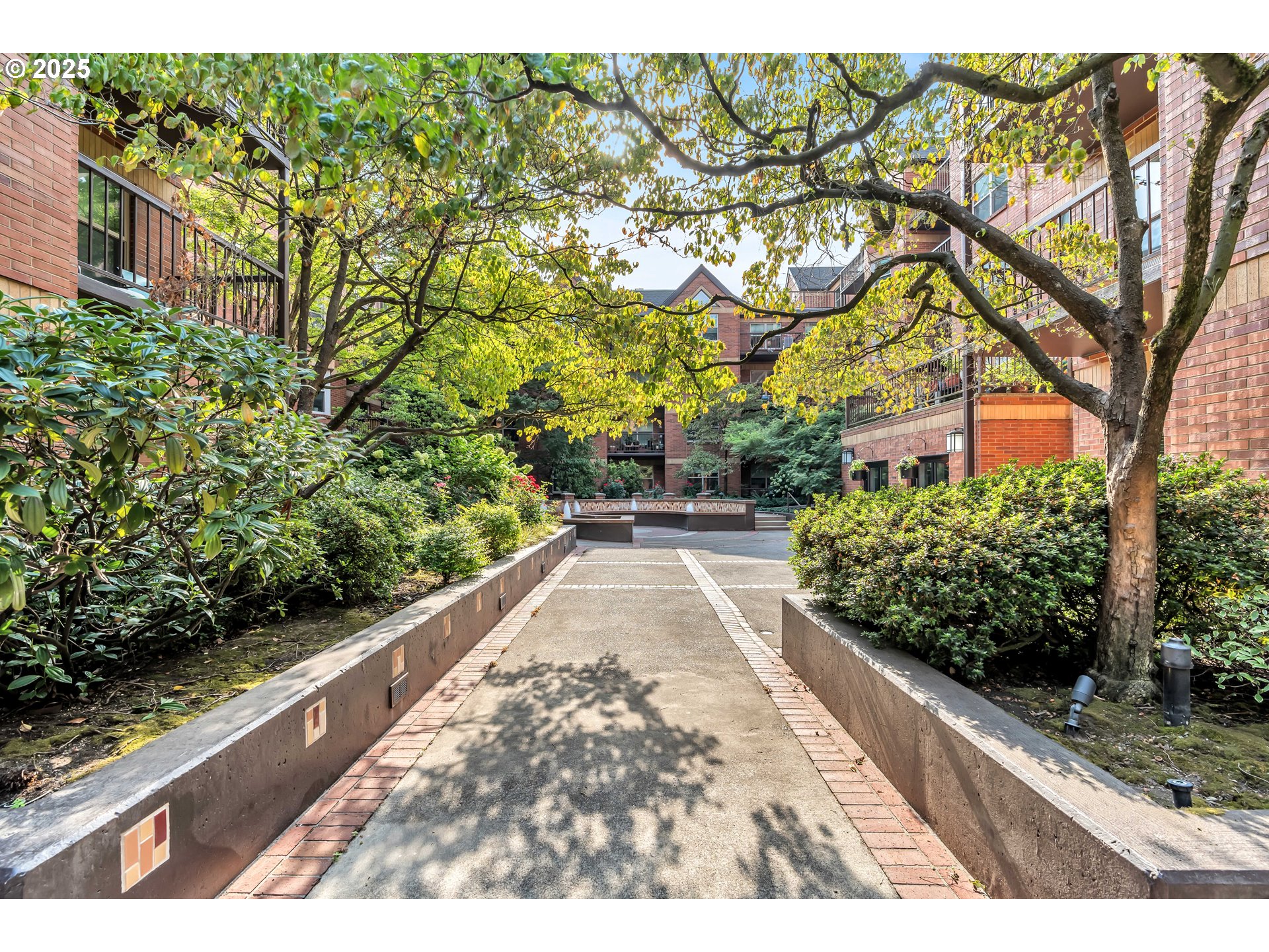 1500 Southwest Park Avenue, Unit 232 Portland, OR 97201 - Photo 29 of 40 a view of a pathway both side of building