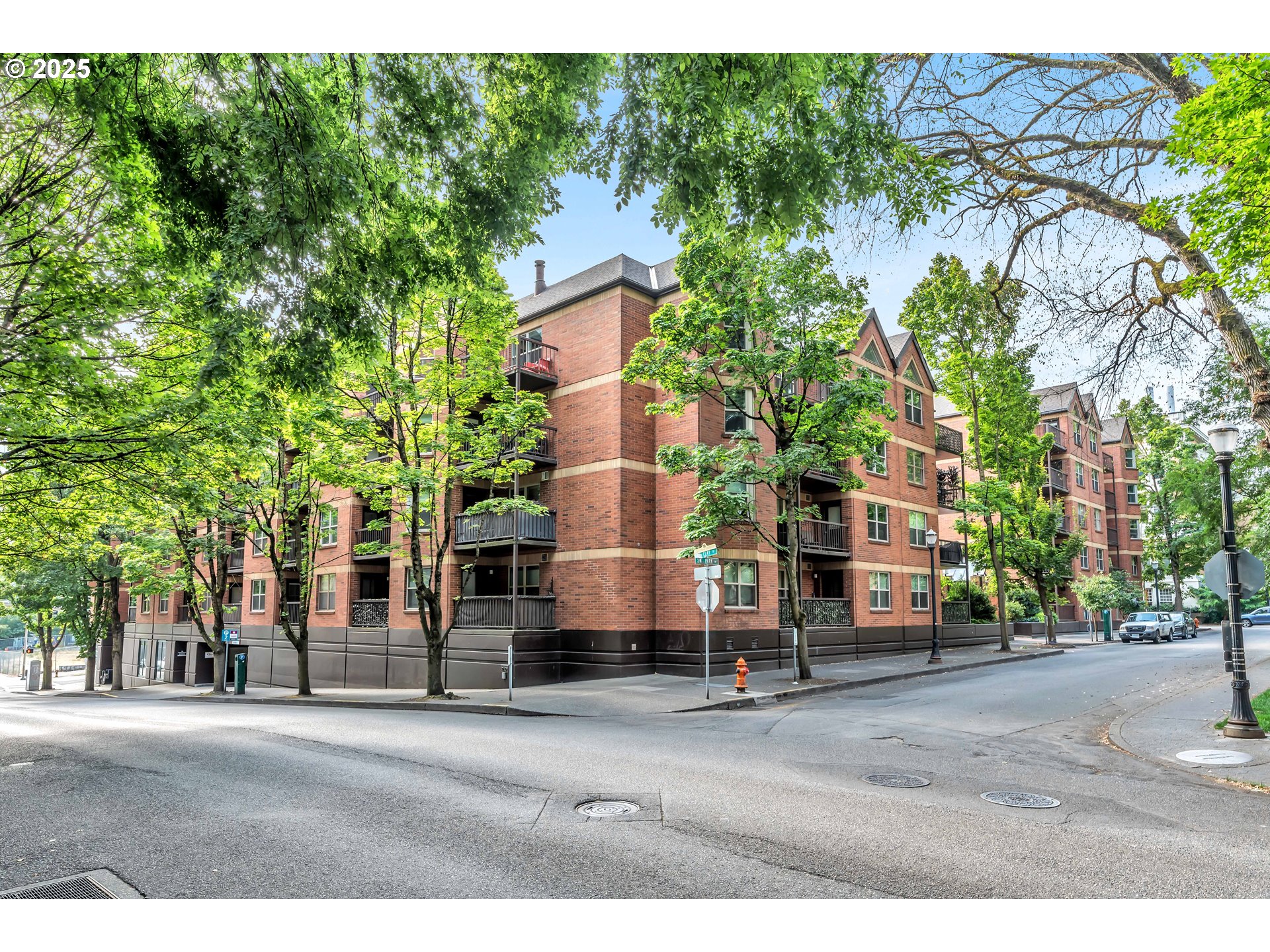 1500 Southwest Park Avenue, Unit 232 Portland, OR 97201 - Photo 34 of 40 a building with trees in front of it