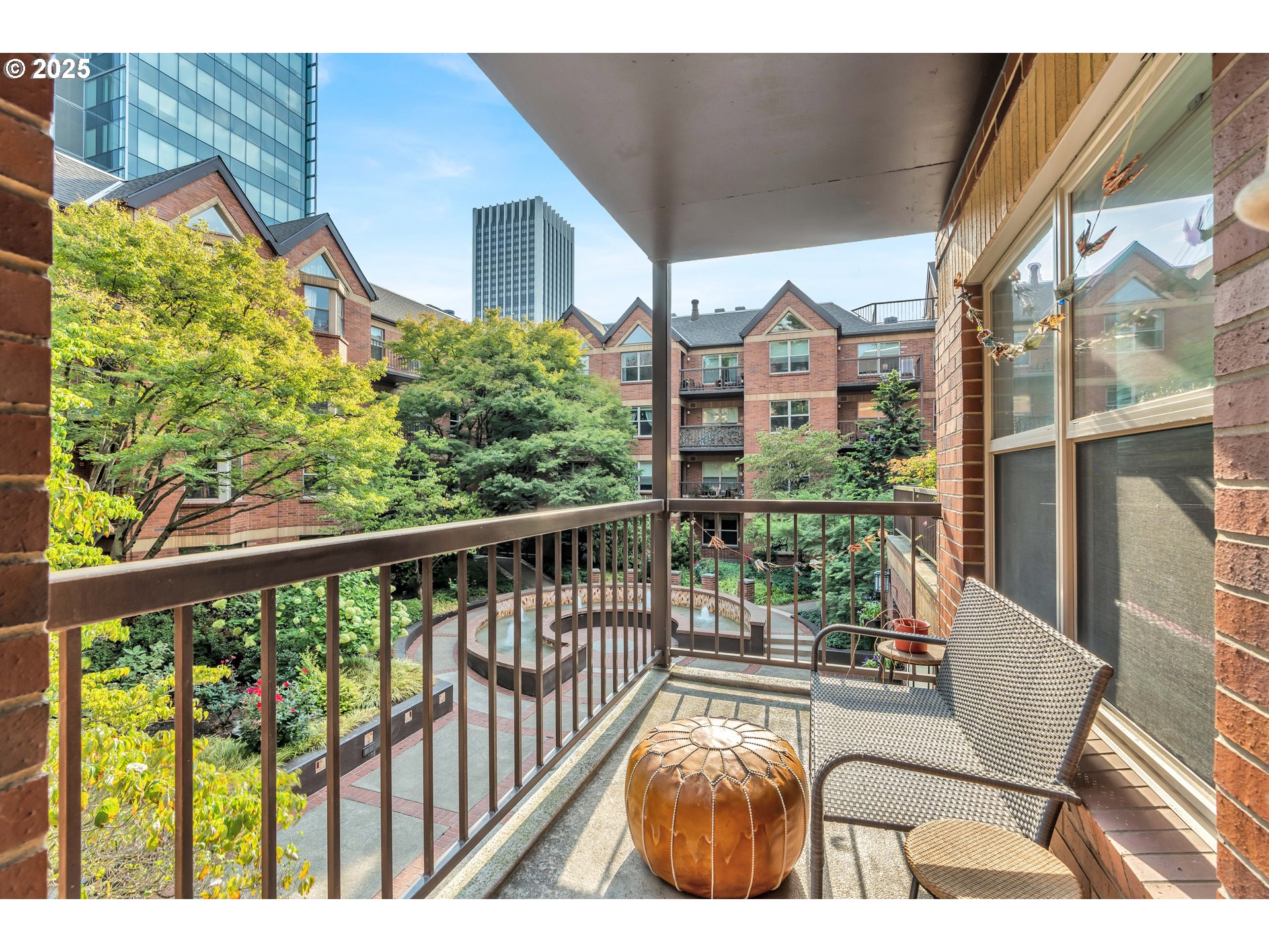 1500 Southwest Park Avenue, Unit 232 Portland, OR 97201 - Photo 5 of 40 a view of a chairs and table in the balcony