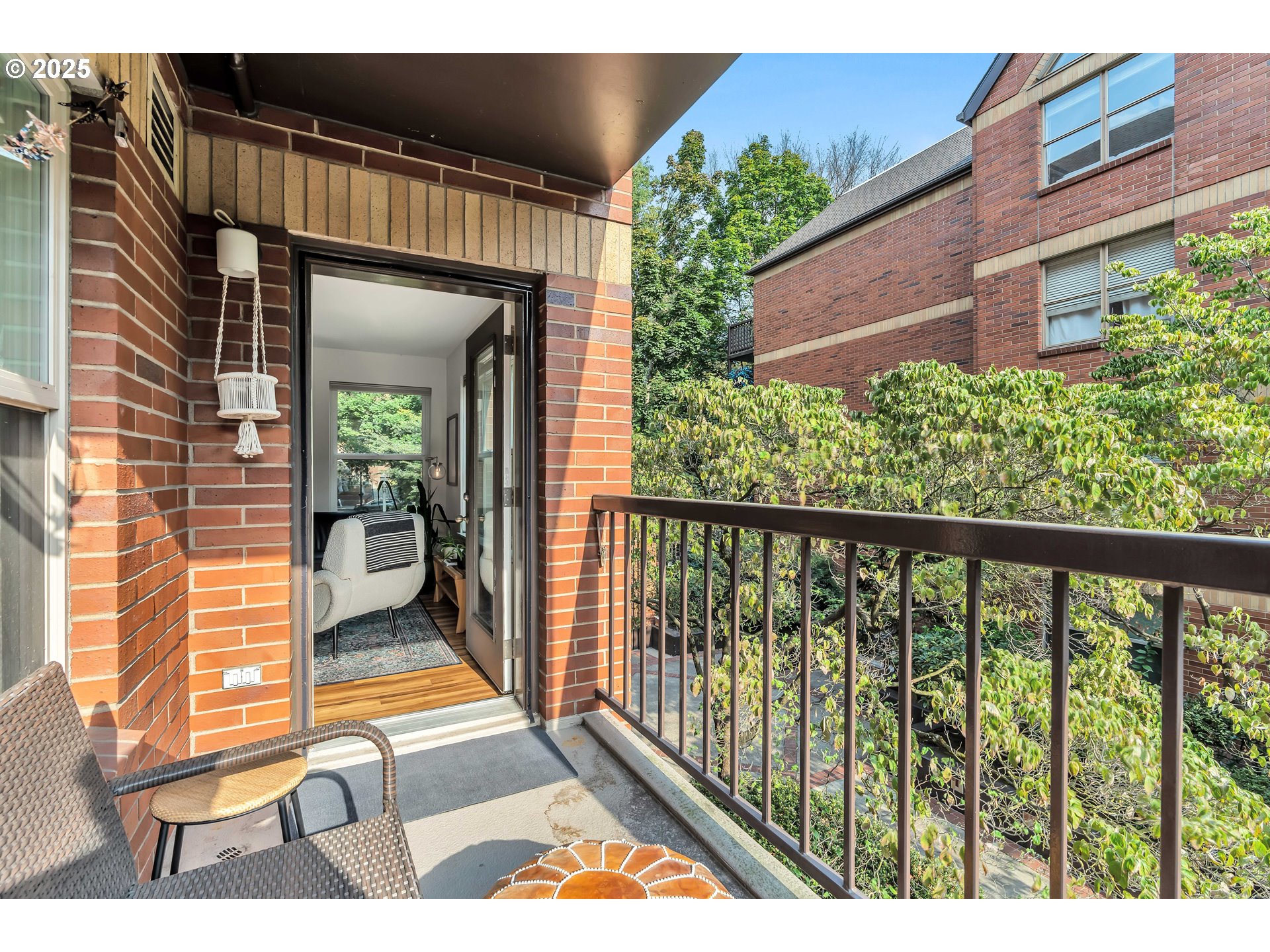1500 Southwest Park Avenue, Unit 232 Portland, OR 97201 - Photo 6 of 40 a view of a balcony with a potted plants